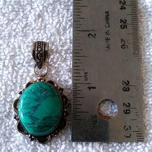 Sterling Silver Santa Rosa Turquoise 1 1/2" total length.